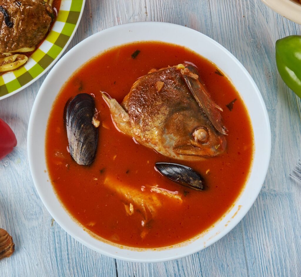 Brodet fish stew with seafood and fish head, a traditional Balkan and Dubrovnik food