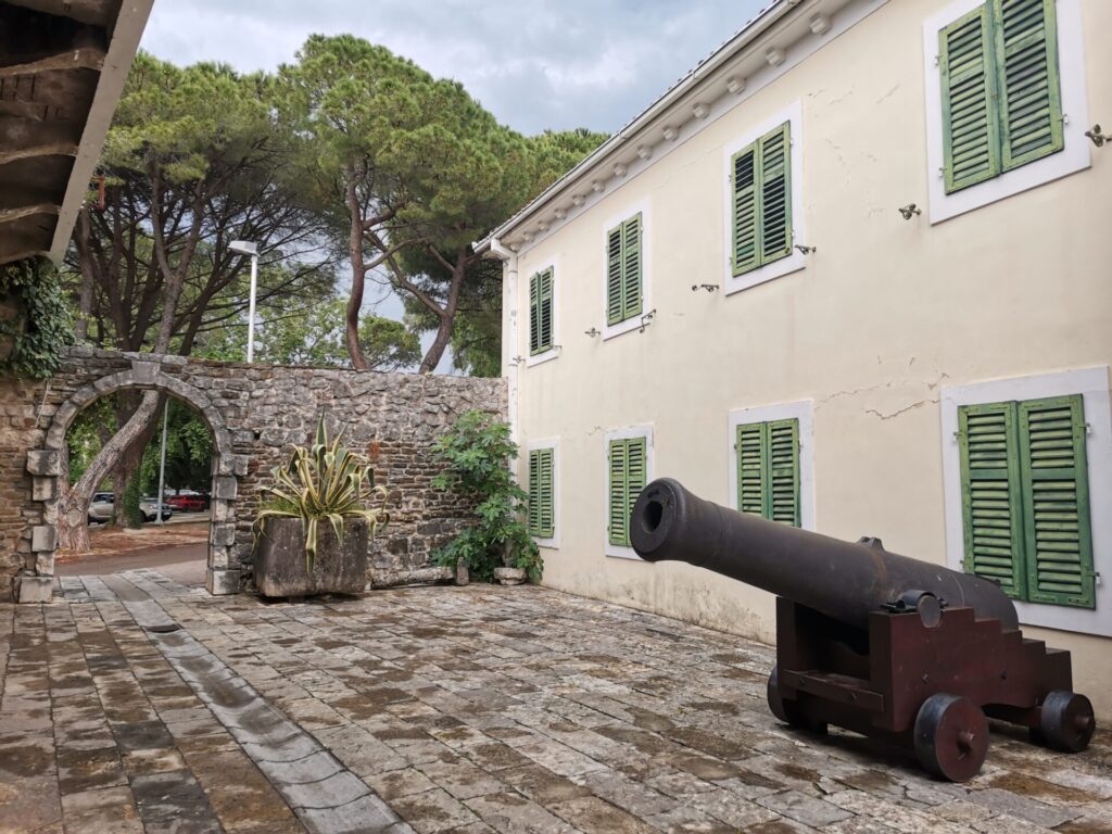 Old house and cannon in Tivat, Montenegro - Tivat Travel Guide