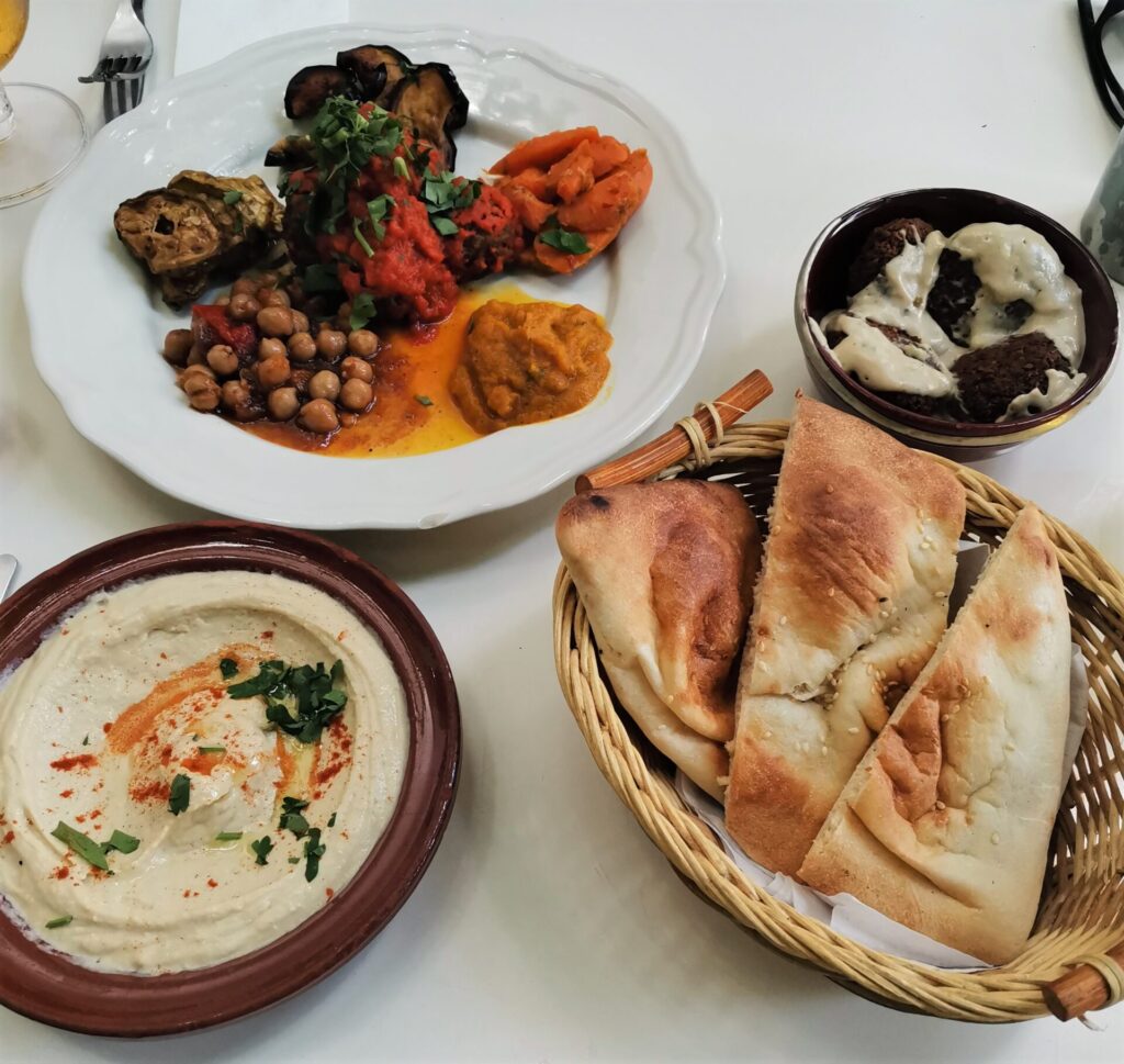 A Moroccan feast of bread, hummus and variety of small colourful sides at Annette in Sofia, Bulgaria