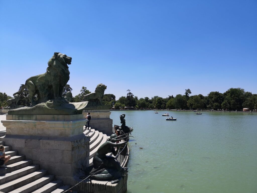El Retiro Park lake on a sunny day in Madrid, Spain
