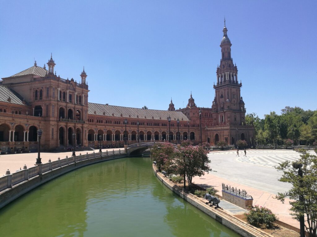 A calm Plaza Espana on a vibrant sunny day