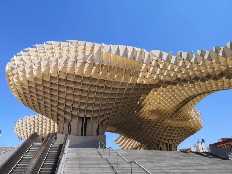A large wooden structure known as Setas de Seville on a sunny day in Seville - One of the more unusual things to do in Seville