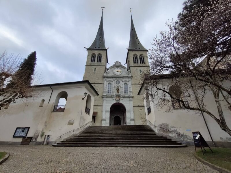 Steps leading up to the Hofkirche St. Leodegar church in Lucerne which features two large towers